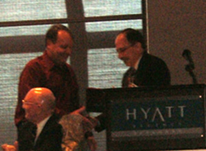 jackson-lesage Dr. Jackson receives his award from NARSC President James LeSage